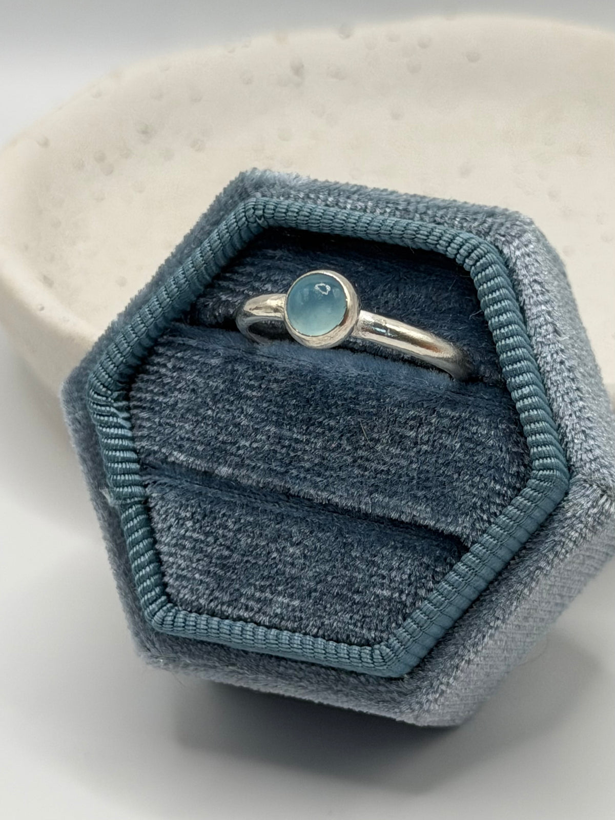 One-of-a-kind round blue chalcedony ring from the Stone + Silver collection by Wild One Jewellery, featuring a smooth blue gemstone cabochon set on a simple sterling silver band.