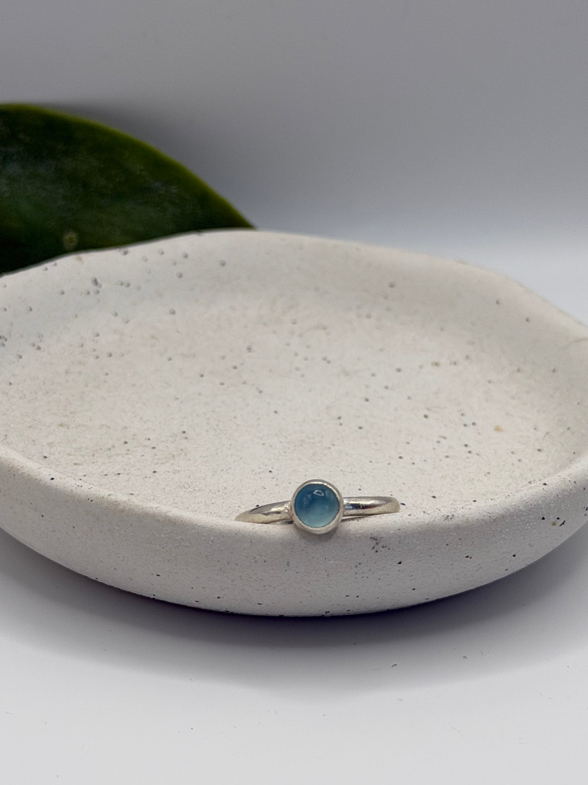 One-of-a-kind round blue chalcedony ring from the Stone + Silver collection by Wild One Jewellery, featuring a smooth blue gemstone cabochon set on a simple sterling silver band.