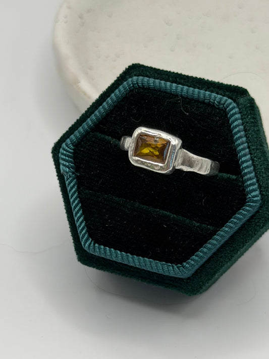 One-of-a-kind 999 fine silver ring handcrafted from silver metal clay, featuring a smoky-coloured cubic zirconia gemstone, part of the Stone + Silver collection by Wild One Jewellery.