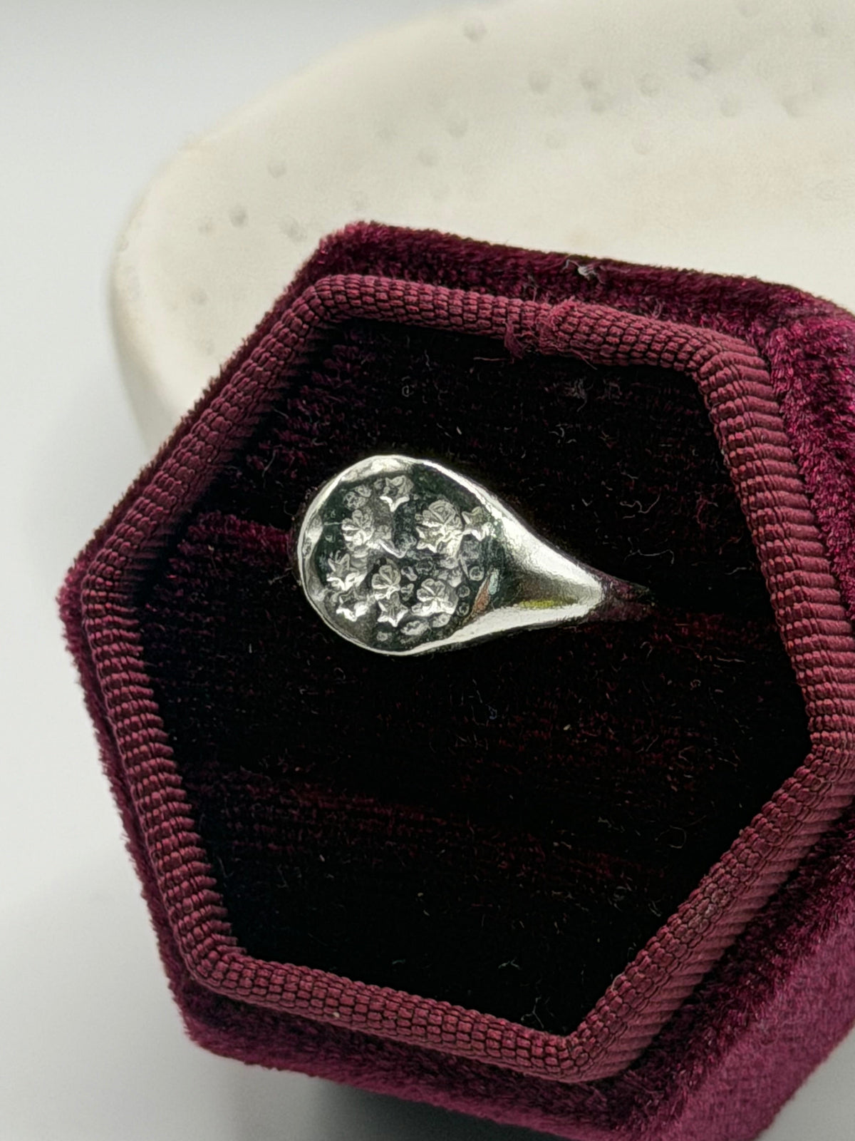Handmade recycled sterling silver Galaxy Signet Ring featuring a circular dimple-textured face with tiny scattered star details, crafted in small batches by independent silversmith Wild One Jewellery in Lincolnshire, UK.