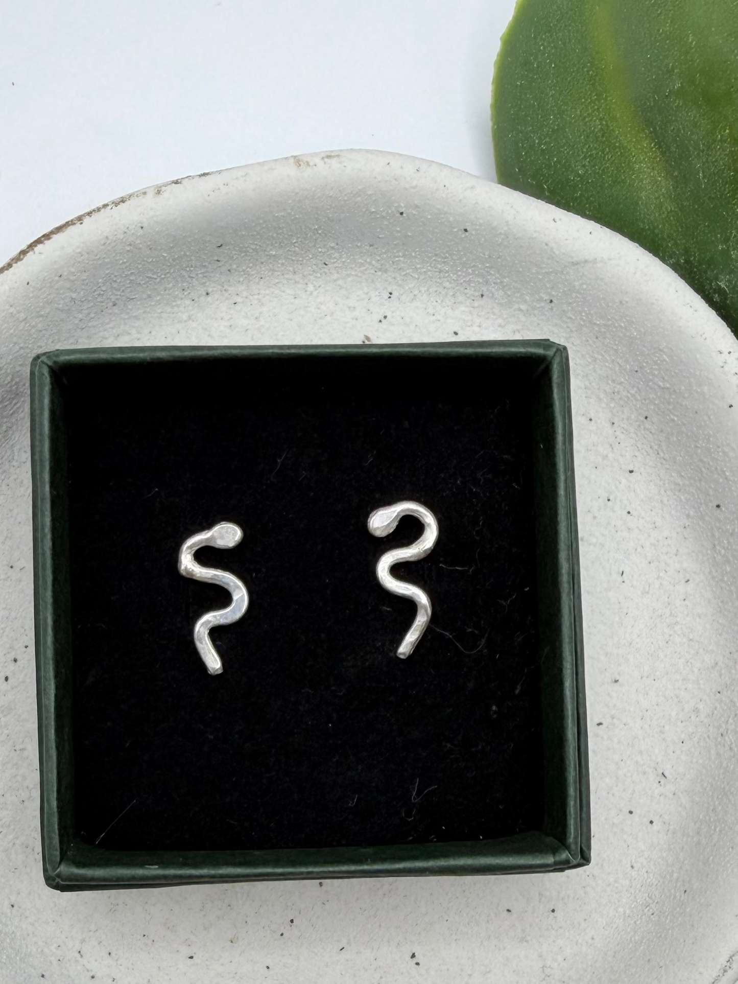 Handmade recycled sterling silver snake stud earrings by Wild One Jewellery, an independent silversmith based in Lincolnshire, UK, creating small-batch, nature-inspired jewellery.