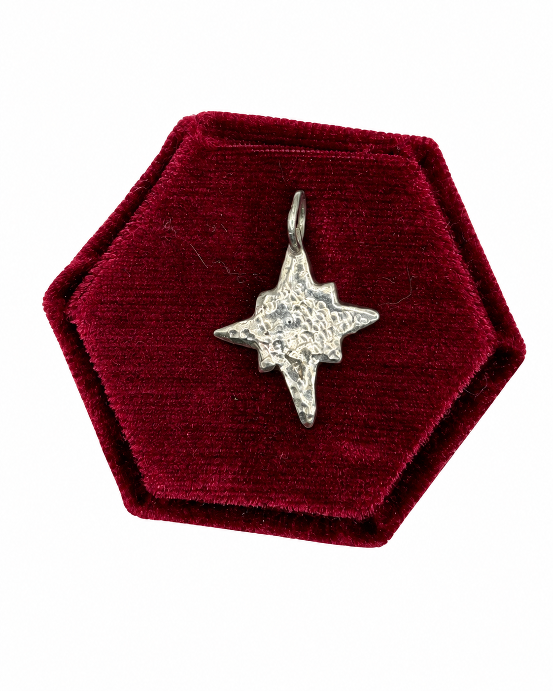 Handmade recycled sterling silver Midi Five-Point Star charm with softly rounded points and a dimple-textured finish, part of the Wild One Jewellery Charm Bar collection.