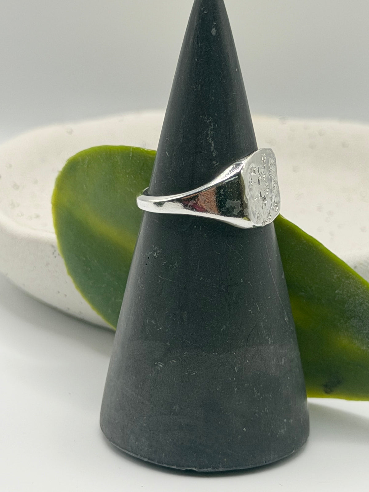 Handmade recycled sterling silver Galaxy Signet Ring featuring a square dimple-textured face with tiny scattered star details, crafted in small batches by independent silversmith Wild One Jewellery in Lincolnshire, UK.