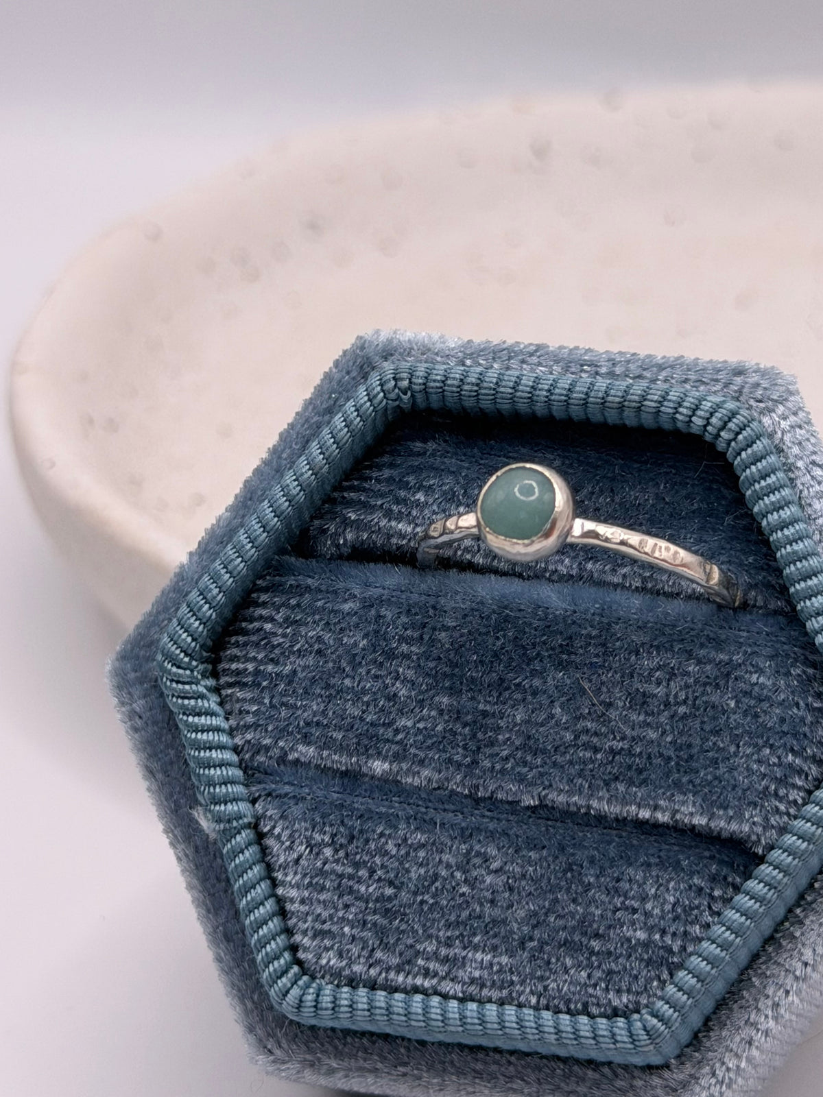 One-of-a-kind oval amazonite ring from the Stone + Silver collection by Wild One Jewellery, featuring a blue-green amazonite cabochon with natural markings set in a sterling silver band.