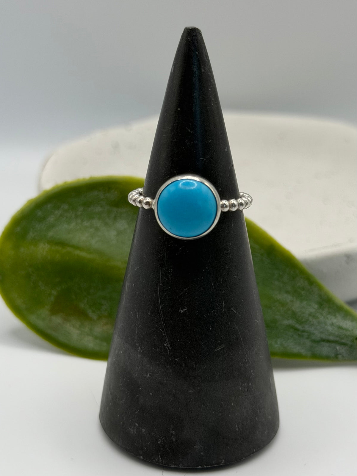 One-of-a-kind turquoise bobble ring from the Stone + Silver collection by Wild One Jewellery, featuring a turquoise cabochon set in a sterling silver band with decorative silver bobble details.
