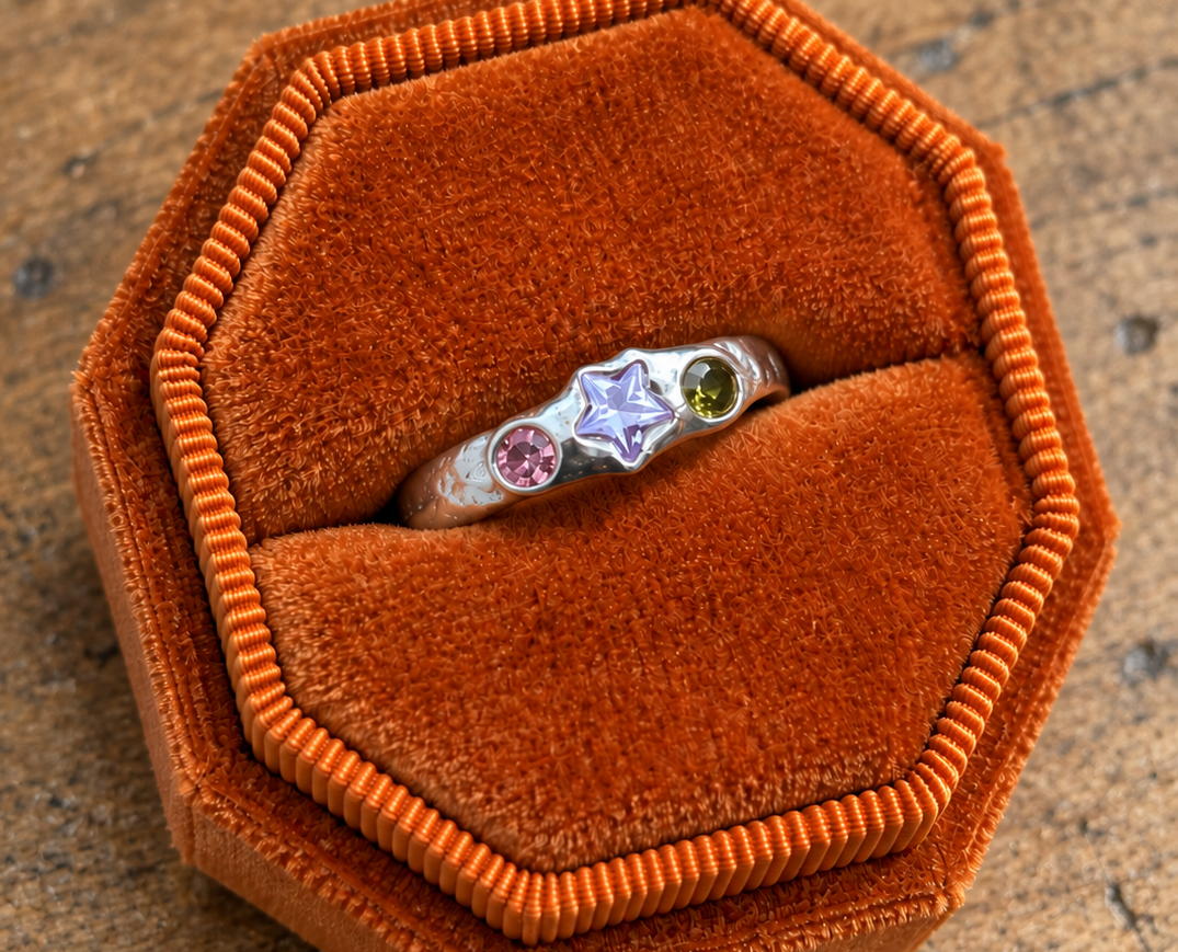 Handmade fine silver ring with colourful lab-created stones, made during the Wild Things Metal Play jewellery workshop in Lincoln